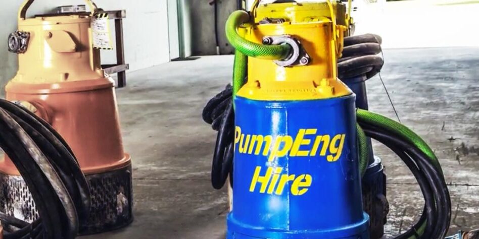 Two pumps, one with 'PumpEng Hire' written on its casing