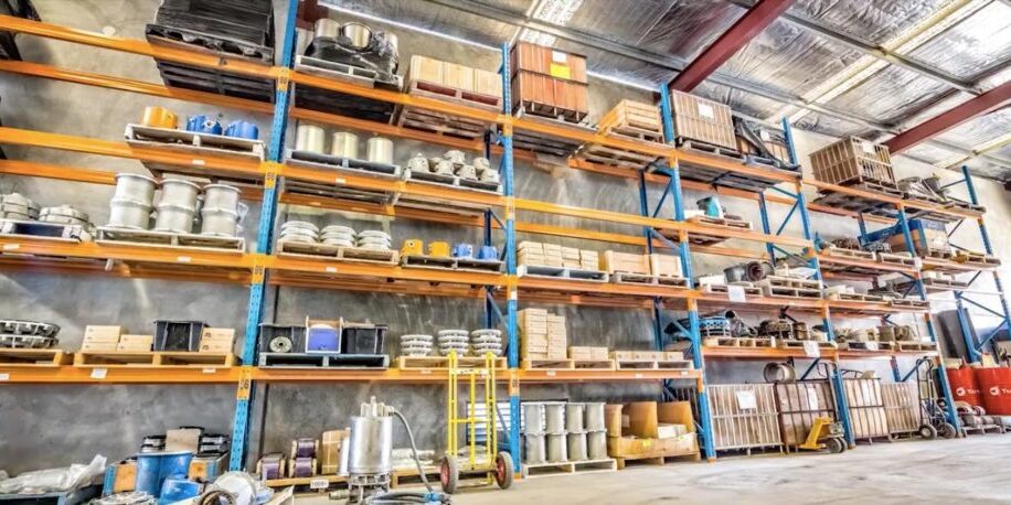 Warehouse shelving containing submersible pump parts